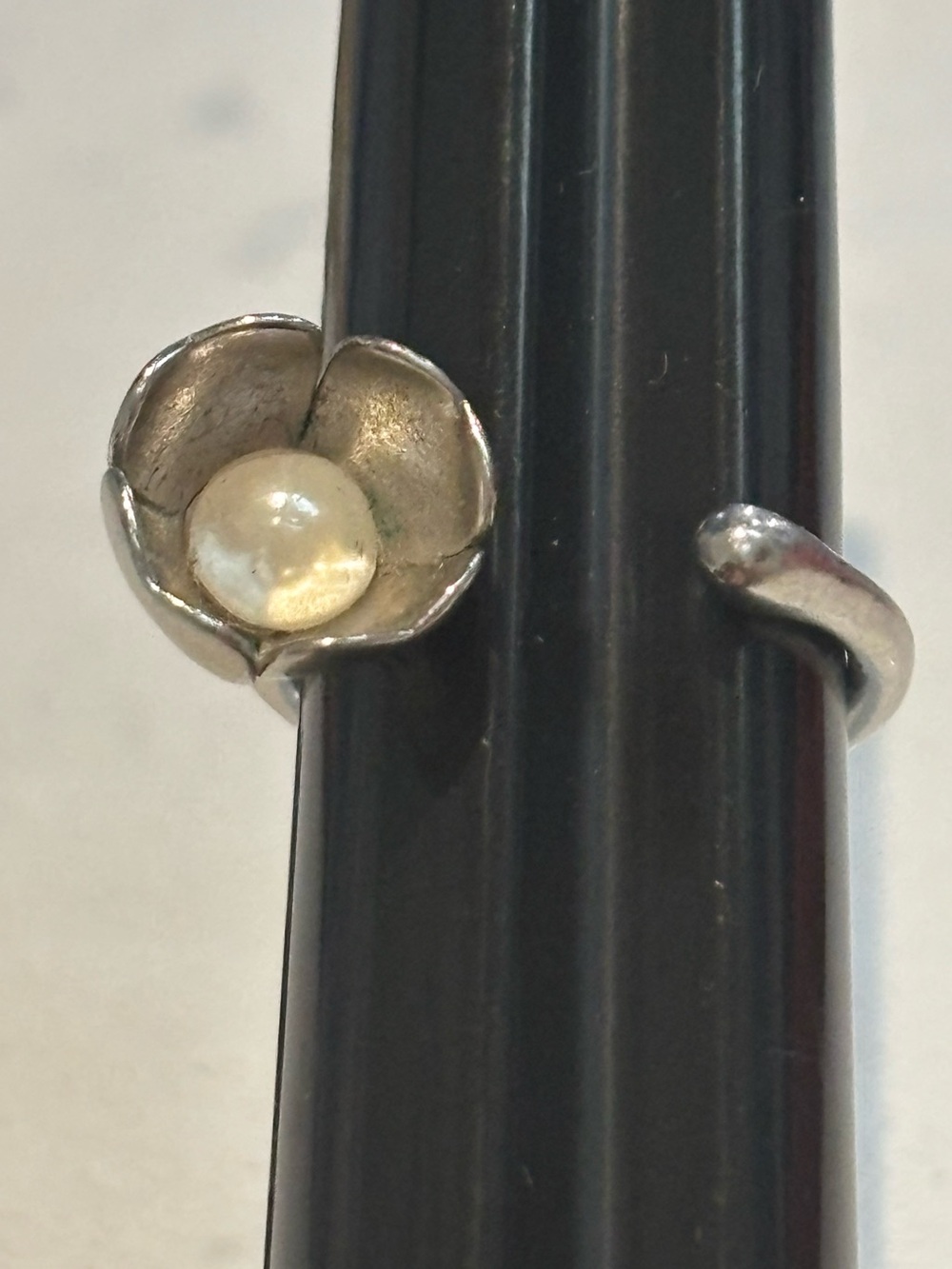 Coach silver tone Lilly flower ring with faux pearl